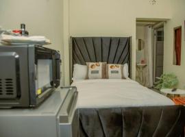 Tiny Haven studio with free WIFI and Netflix，位于纳纽基的公寓