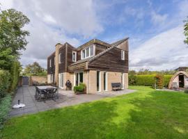Luxe vrijstaande recreatiewoning met tuinsauna, hotel a De Cocksdorp