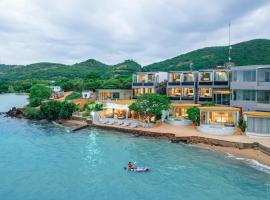 Madusea Grand Villa มาดูซี แกรนด์ วิลล่า, khách sạn có bồn tắm nóng ở Koh Larn