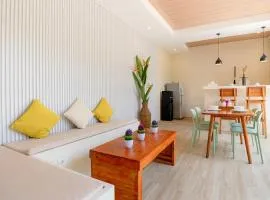 KIKI VILLAGE BATHTUB AND LIVING ROOM