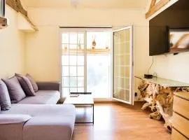 Duplex dans grande ferme rénovée