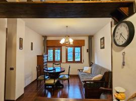 Appartamento accogliente nel Cadore, 30 min Cortina, ξενοδοχείο σε Pozzale