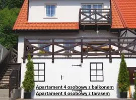 Apartamenty i pokoje Mikołajki