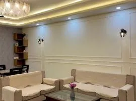 2bhk luxury White lotus apartment by madanan