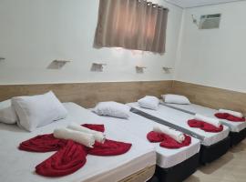 Pousada Quarto tv Smart ar Garagem Gratuita, hotel em Aparecida