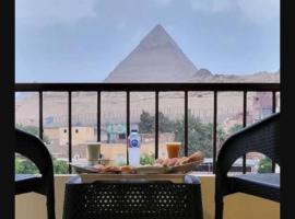 Pyramiden view inn, hotel en Banī Ghālib
