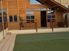 اكواخ روزڤيو الفندقيه Roseview Cottages, chalet de montaña en Taif