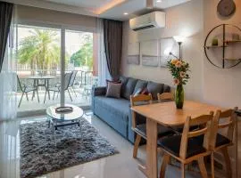 Babylone Sky Garden 206 - 1 BR condo - 2 pools & gym - seaview