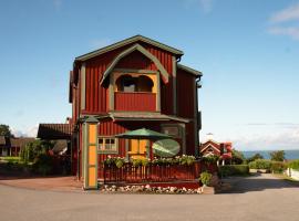 Lustigsgården Boutique Hotel, hotel u gradu Retvik