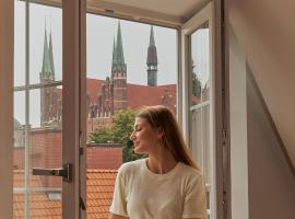 3-level apartment with a view of St Mary's Basilica by Downtown Apartments