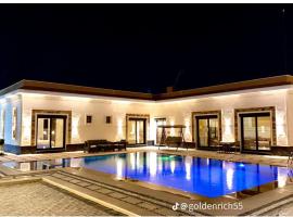 Reef Golden Resort شاليه الريف الذهبي, hotel con estacionamiento en Qaryat ash Shamālī