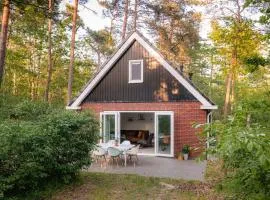 Heerlijk vakantiehuis met bosrijke tuin