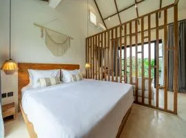 Live Amidst Greenery - Cozy Retreats at Sarang Apartment 6