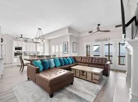 Jaw-dropping bayfront home with panoramic water views, boat slip, and cowboy pool