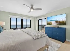 Renovated direct oceanfront condo with spacious balcony, heated pool, and garage parking