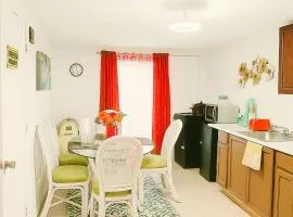 Private entrance guest suite dedicated bathroom kitchen