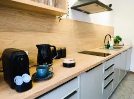 Kolory Warmii Apartamenty Biały i Szary