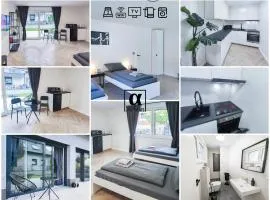 ALFA Stuttgart Doppelzimmer mit Teeküche und Terrasse Porsche Bosch l Gemeinschaftsbad WIFI SmartTV l Double room with kitchenette and terrace l shared bathroom BS21A5