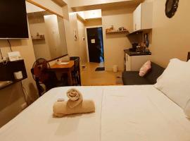 1218 T4 Atria Comfy Cozy Central，位于伊洛伊洛的酒店