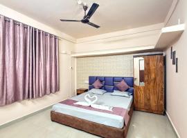 Royal Palace โรงแรมในดิบรูการ์