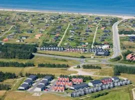 8 person holiday home on a holiday park in Løkken
