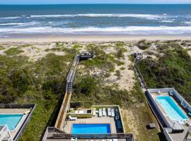 7080 - Cool Breeze, hotel en Grun Island