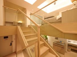 Qinghai Xisu, Hotel in Dalian