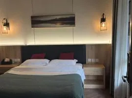Heinemann Hotel Sunny King Room without Bathtub A308 with a jacuzzi and a local