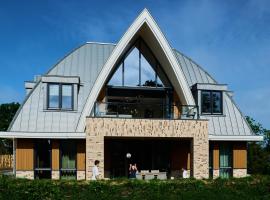 Droomsuites Texel 8 personen by Droomvilla, Hotel in Den Burg