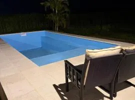 Casa con Piscina sobre Laguna Brava - Tranquilidad y Naturaleza en Barrio Privado