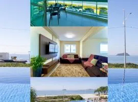 Apto Frente Mar Bali Beach Home Club 3 Quartos Climatizados Cozinha Completa Sacada com Churrasqueira 2 Vagas de Garagem Piscina borda infinita Sauna Academia Cinema Quadra Salão de Jogos Pé na Areia 15min do Beto Carrero