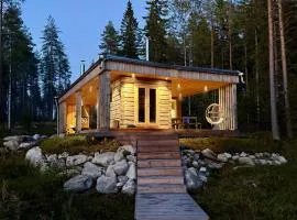 Ulvontähti - moderni mökki järven rannalla