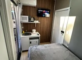 Loft Lux SM Chapecó | Conforto e Praticidade com Ar, Cozinha e Smart TV