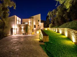 Golden Bay Suites & Maisonettes, cottage in Parga