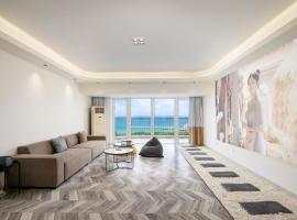 Sanya Sun Seaview Apartment، فندق في سانيا