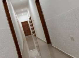 BS Suites, ξενοδοχείο σε Kweman