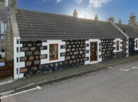 Tranquil Coastal Cottage with Stunning Views