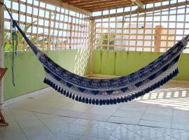 Casa com 5 suítes e Churrasqueira para 12 pessoas, hotel in Atalaia