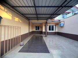 Amani guesthouse, hotel que acepta mascotas en Padang Besar