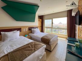 Grand museum & pyramids view inn, hotel v destinaci Banī Ghālib