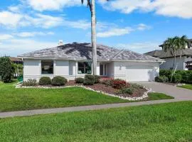 Coastal waterfront home with pool spa and dock