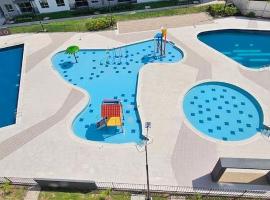Condominio AZUL RICAURTE Apartamento con 4 piscinas，位于里考尔特的酒店