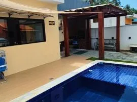 Casa recém construída + piscina, próxima da praia