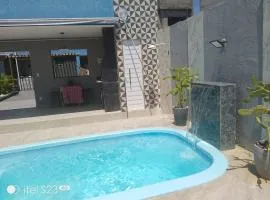 Casa com piscina e área gourmet em Arembepe