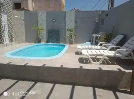 Casa com piscina e área gourmet em Arembepe