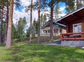 Log cottage by the lake, hotel em Kuopio