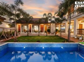 StayVista at Bella Villa with Bathtub, Pool, WiFi, viešbutis mieste Asangaon