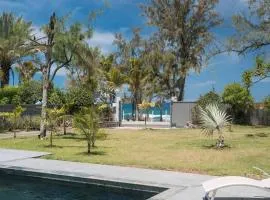 VILLA Ô 3 CAP - Magnifique Villa - classée 4 étoiles - Piscine CHAUFFEE - 4 ch - 8 personnes - accès direct à la plage et à l'esplanade de BOUCAN CANOT