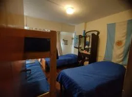 Cama en habitacion compartida