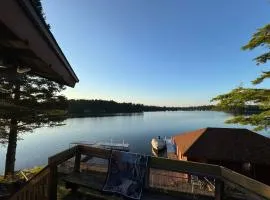 6BR Waterfront Lodge on Round Lake Private Sandy Shoreline Dock Fire Pit Panoramic Views